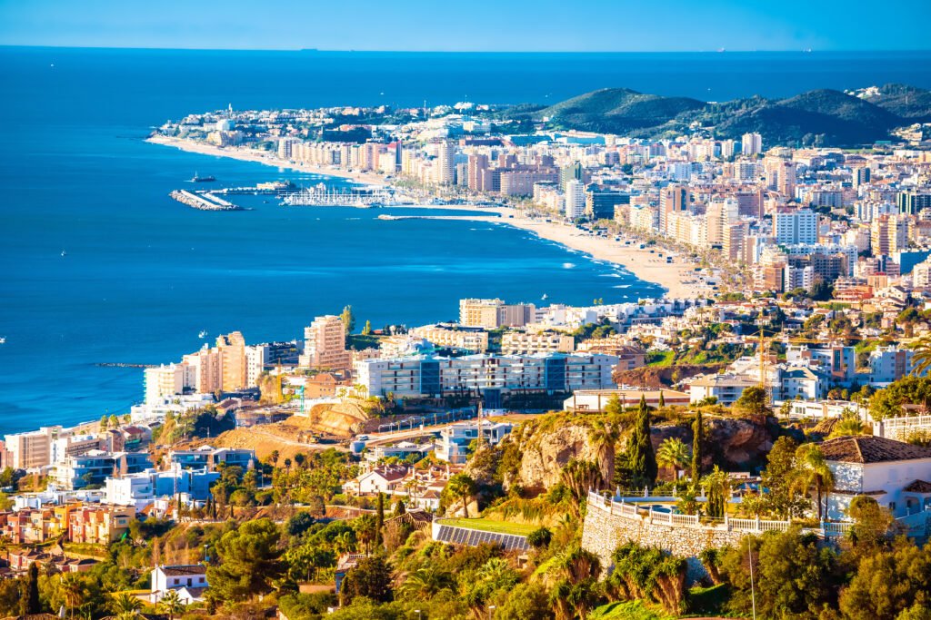 Wide beach and promenade in Fuengirola on a sunny day